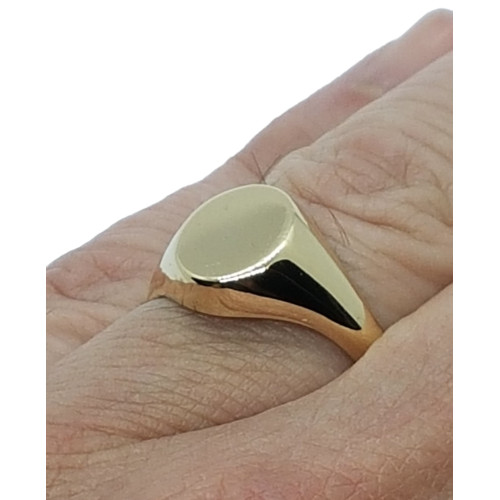 sello oval de oro amarillo