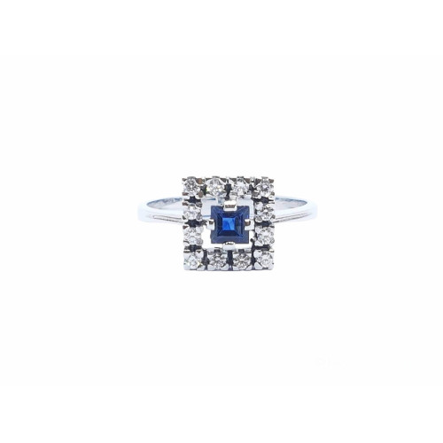Anillo de oro blanco con diamantes y zafiro