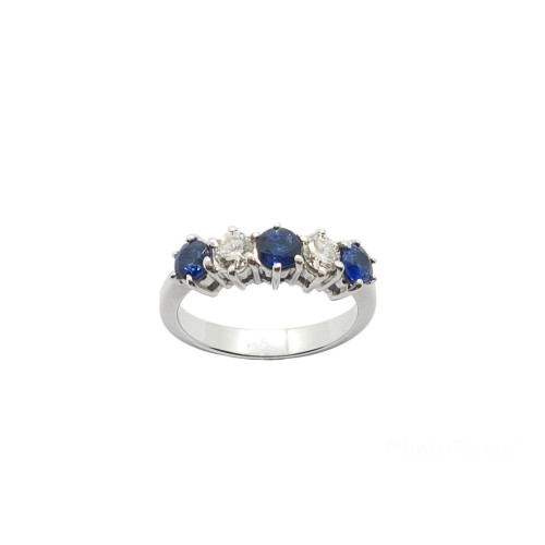 Anillo de oro blanco con diamantes y zafiros