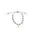 Pulsera de macramé con  cruz de oro