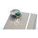 Anillo de plata y oro con malaquita
