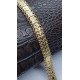 Pulsera de oro amarillo con decoración floral