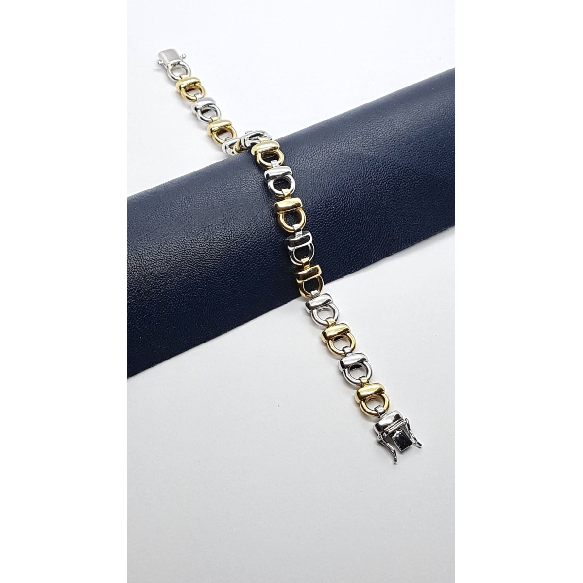 Pulsera articulada de oro amarillo y oro blanco