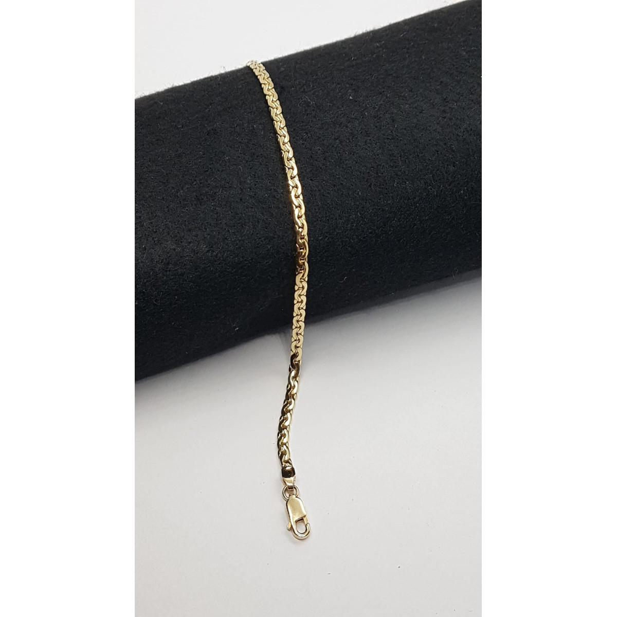 Pulsera maciza y articulada de oro amarillo