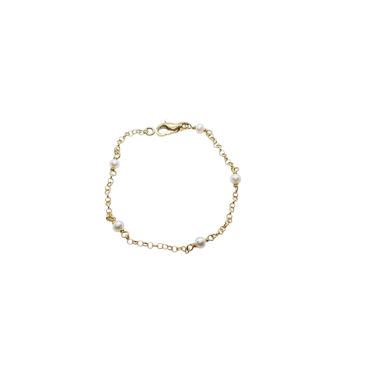 Pulsera articulada de oro amarillo combinada con perlas naturales cultivadas