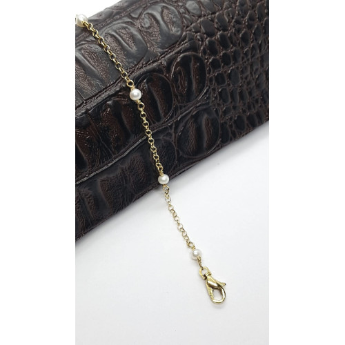 Pulsera articulada de oro amarillo combinada con perlas naturales cultivadas