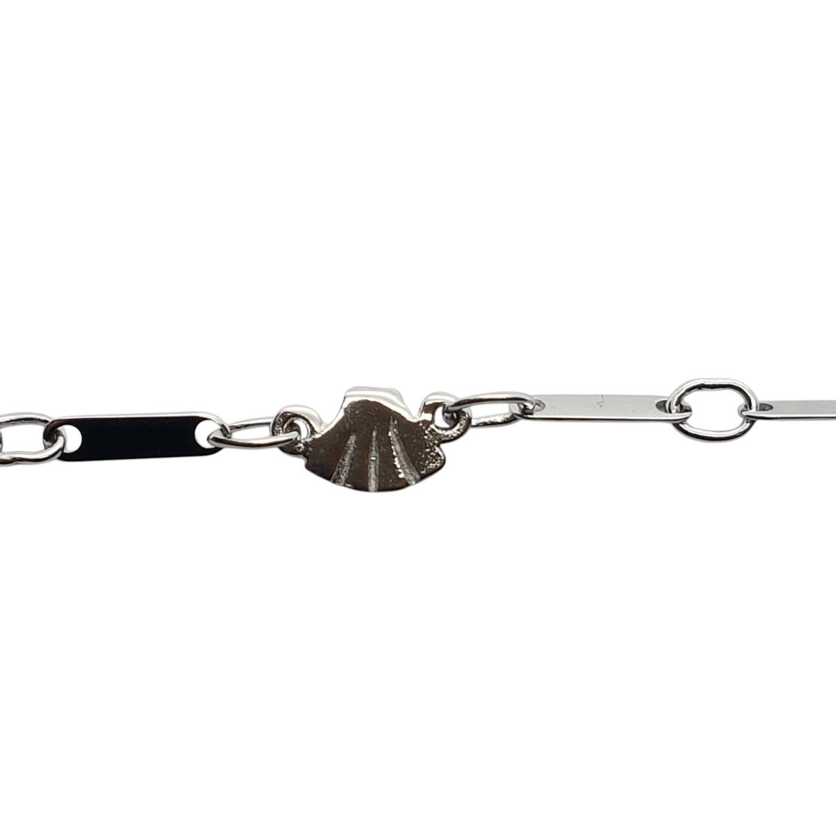 Pulsera articulada de oro blanco con motivos marinos