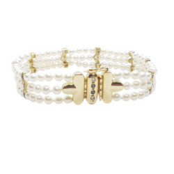 Pulsera de oro amarillo con perlas naturales cultivadas y diamantes negros y blancos