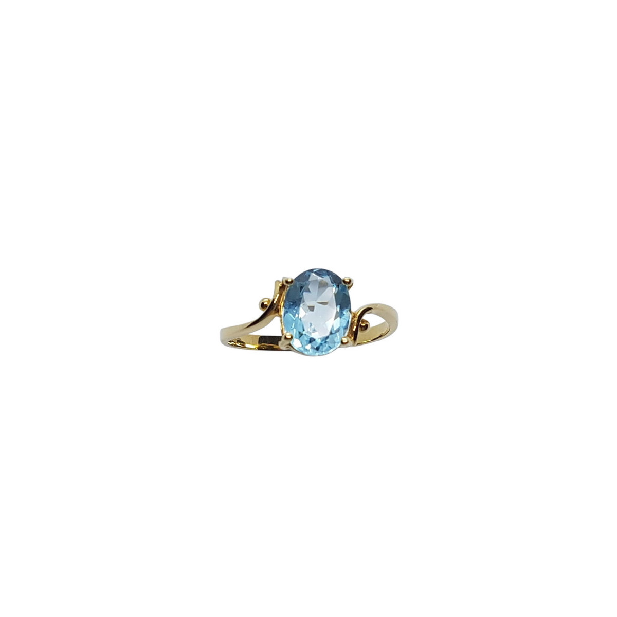 Anillo de oro amarillo con TOPACIO AZUL