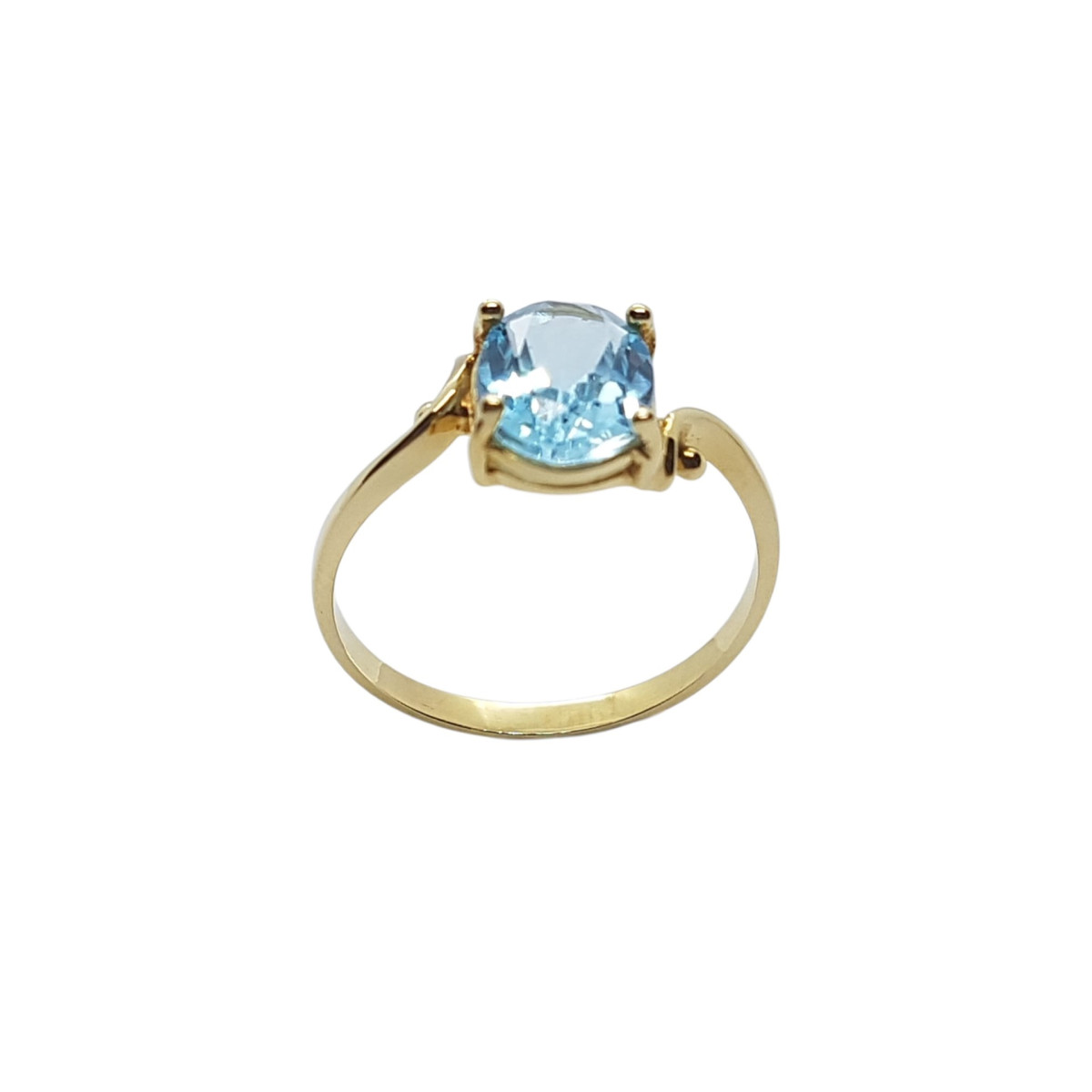 Anillo de oro amarillo con TOPACIO AZUL