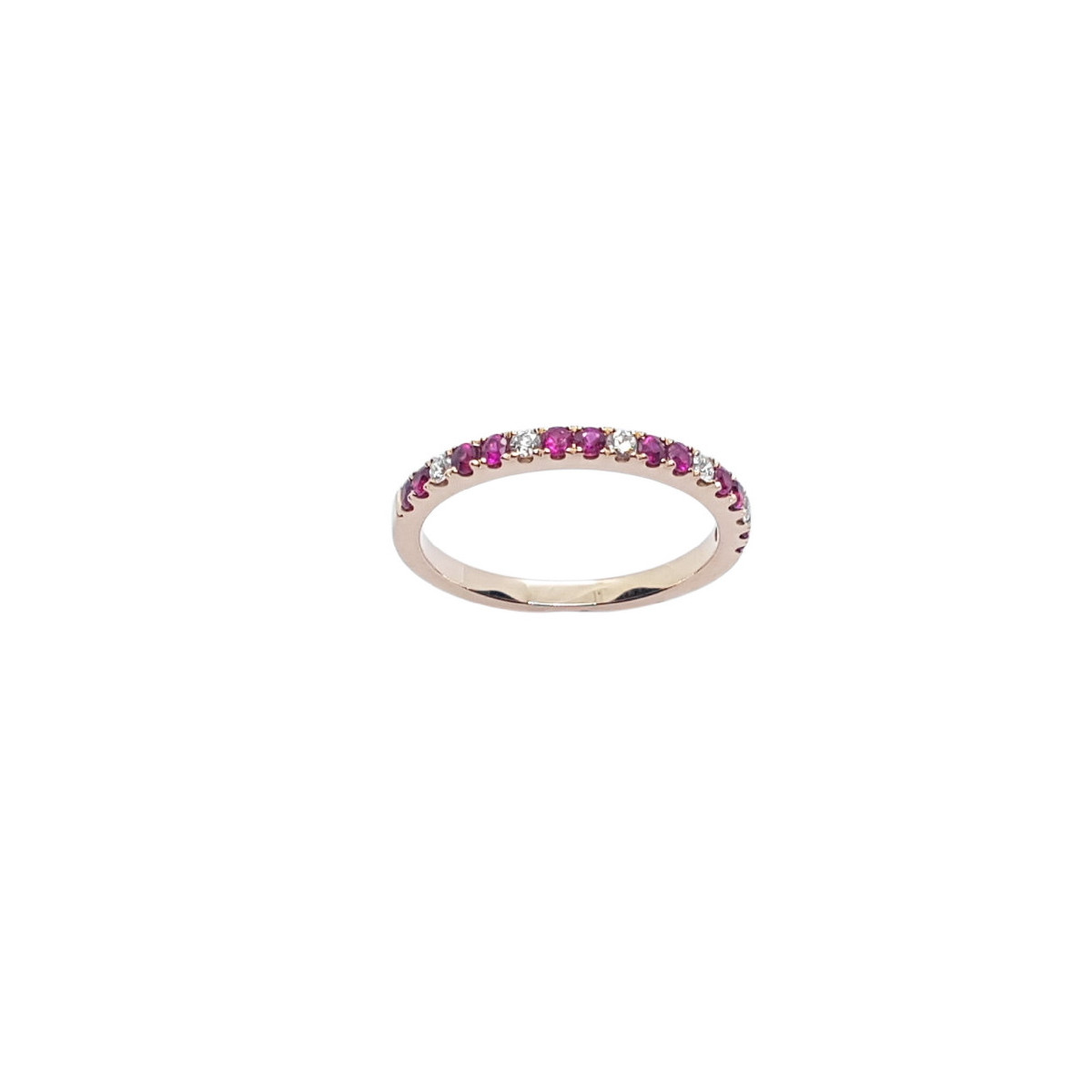Anillo de oro rosa con diamantes y rubíes