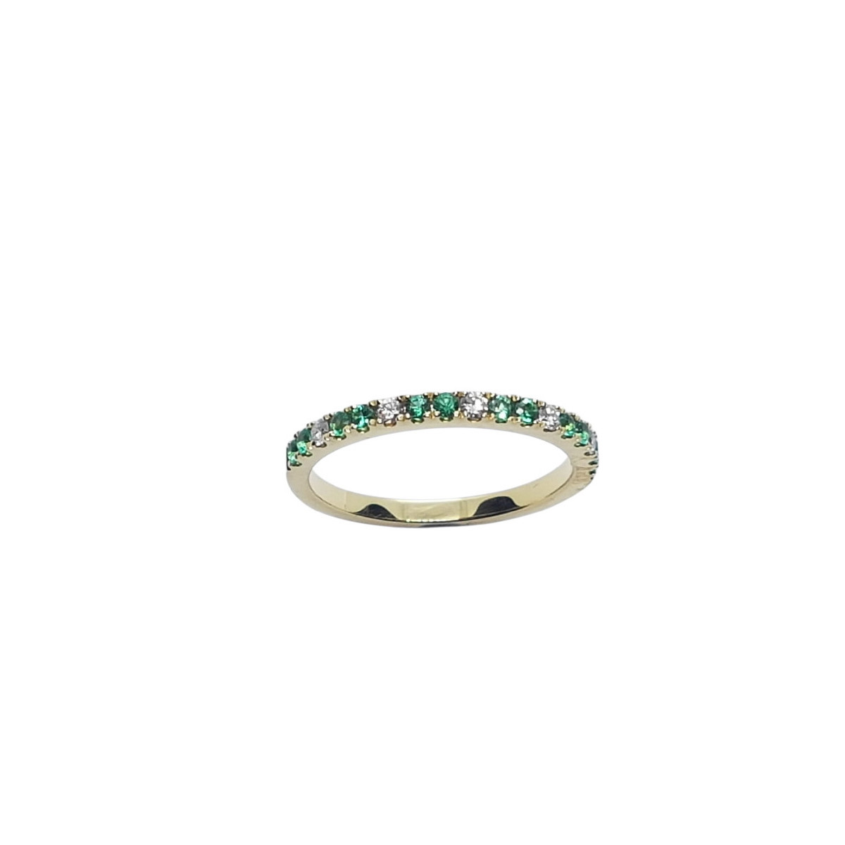 Anillo de oro amarillo con diamantes y esmeraldas