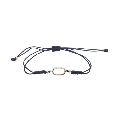 Pulsera de oro con diamantes y macramé