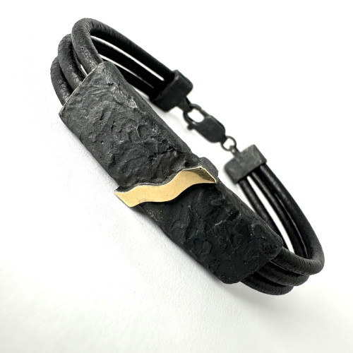Pulsera de plata y oro con cuero Pulsera de plata y oro con cuero