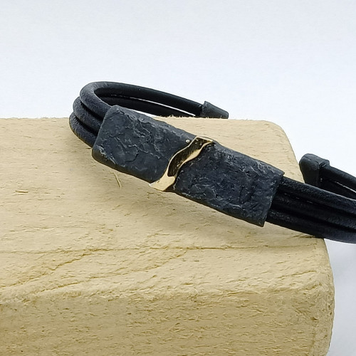 Pulsera de plata y oro con cuero Pulsera de plata y oro con cuero