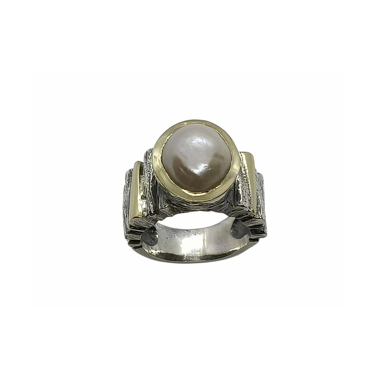 Anillo de plata y oro con perla
