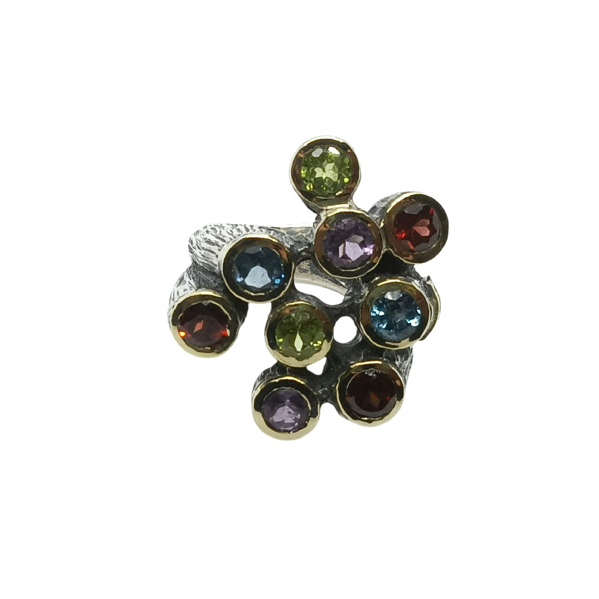 Anillo de plata y oro con peridotos, topacio azul, granates y amatistas