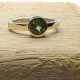 Anillo de plata y oro con peridoto