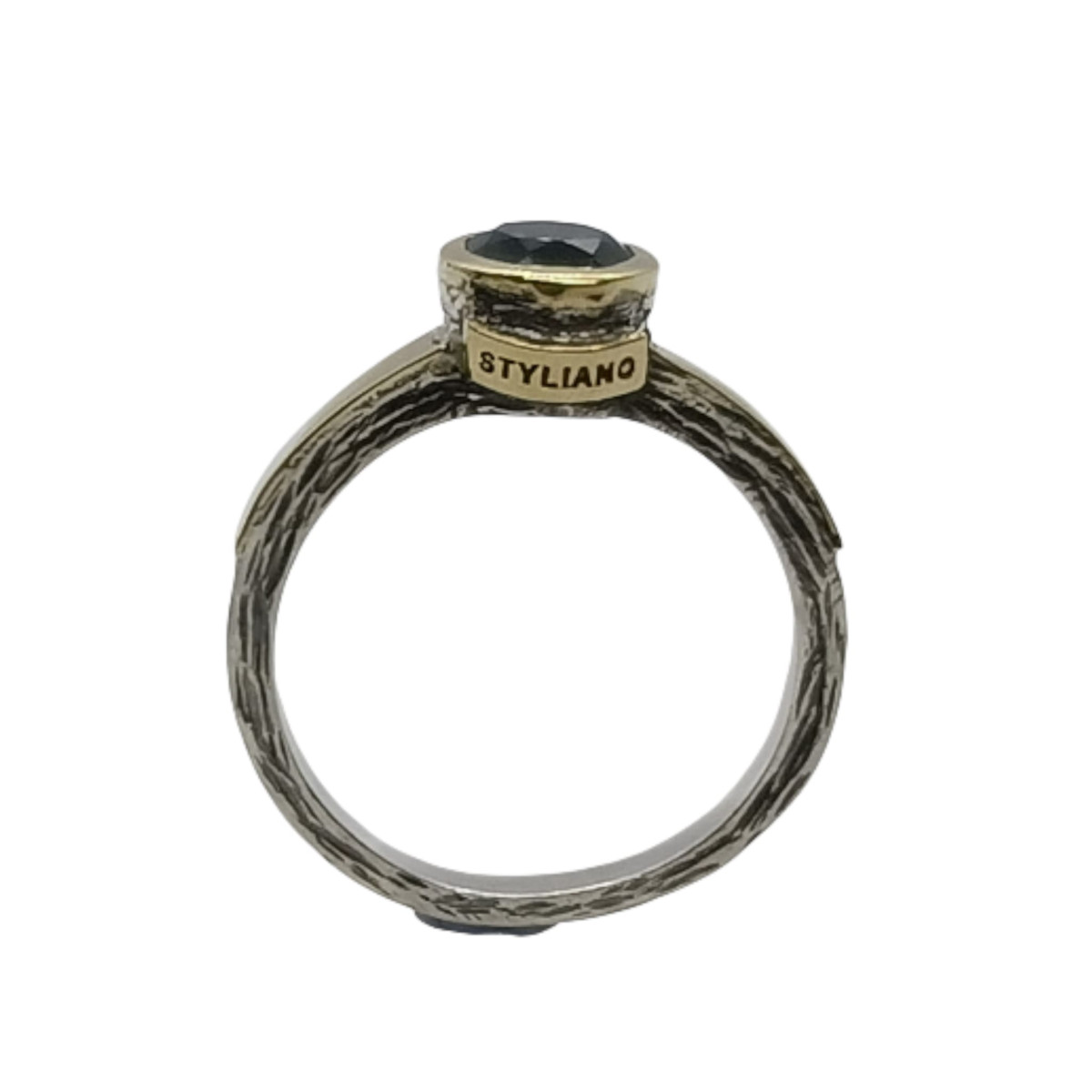 Anillo de plata y oro con peridoto