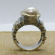 Anillo de plata y oro con perla