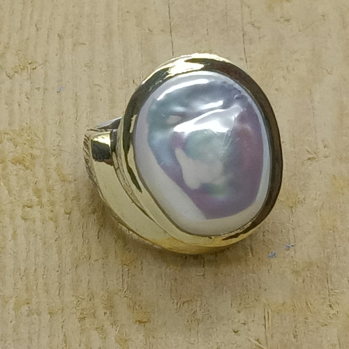 Anillo de plata y oro con perla