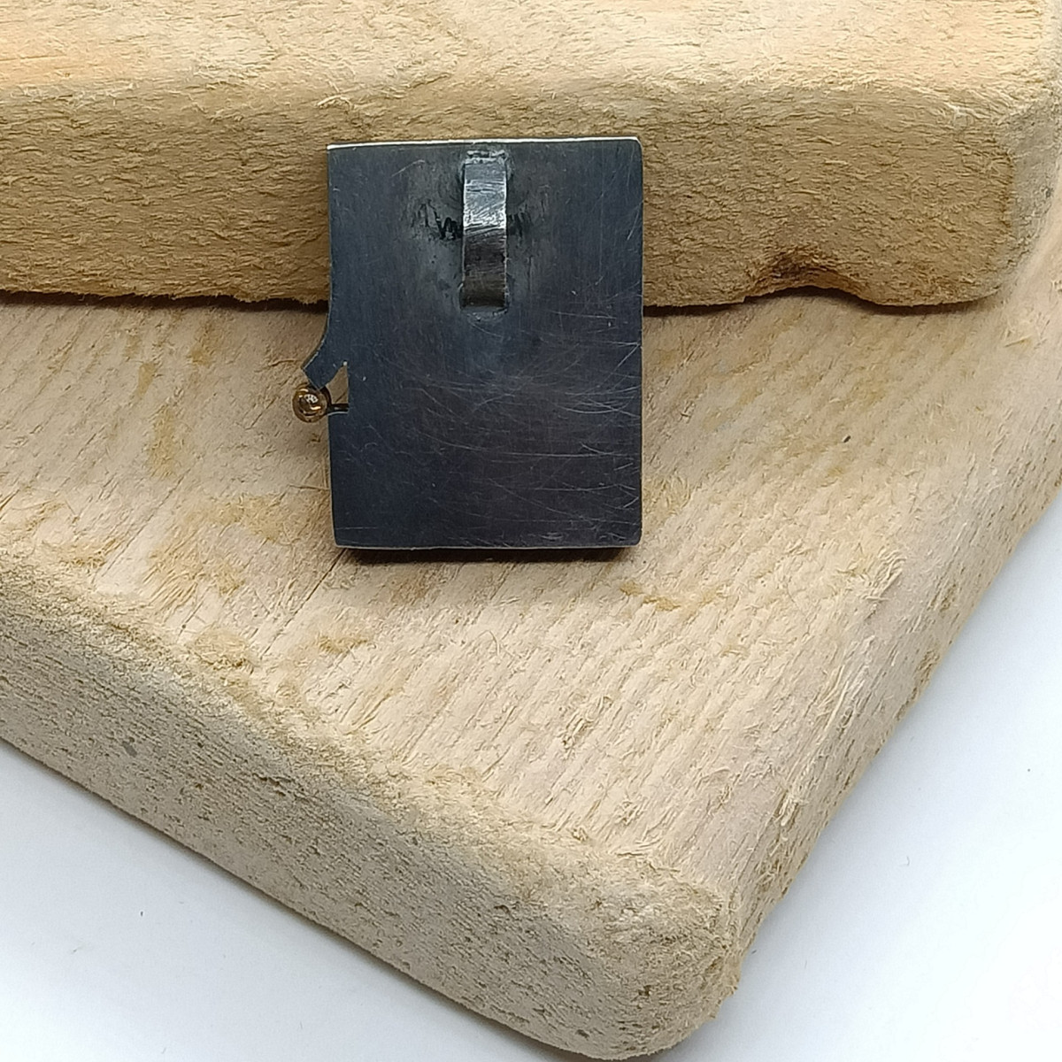 Colgante de plata y oro con ámbar y diamante