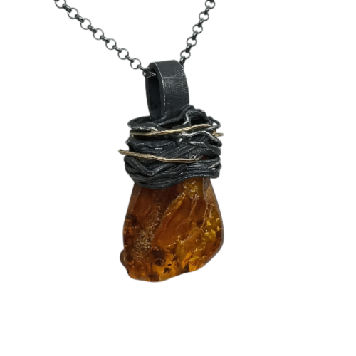 Colgante de plata y oro con ámbar