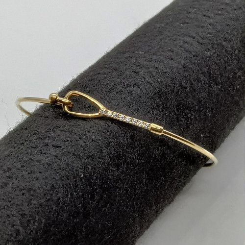 BRAZALETE RÍGIDO DE ORO AMARILLO CON DIAMANTES