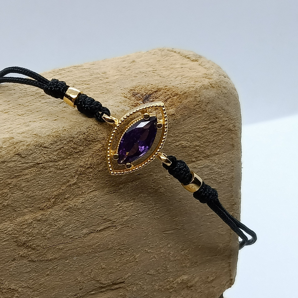 Pulsera de plata con macramé y circonita