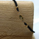 Pulsera de plata con macramé y circonita