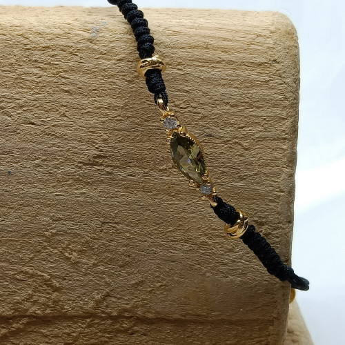 Pulsera de plata con macramé y circonita