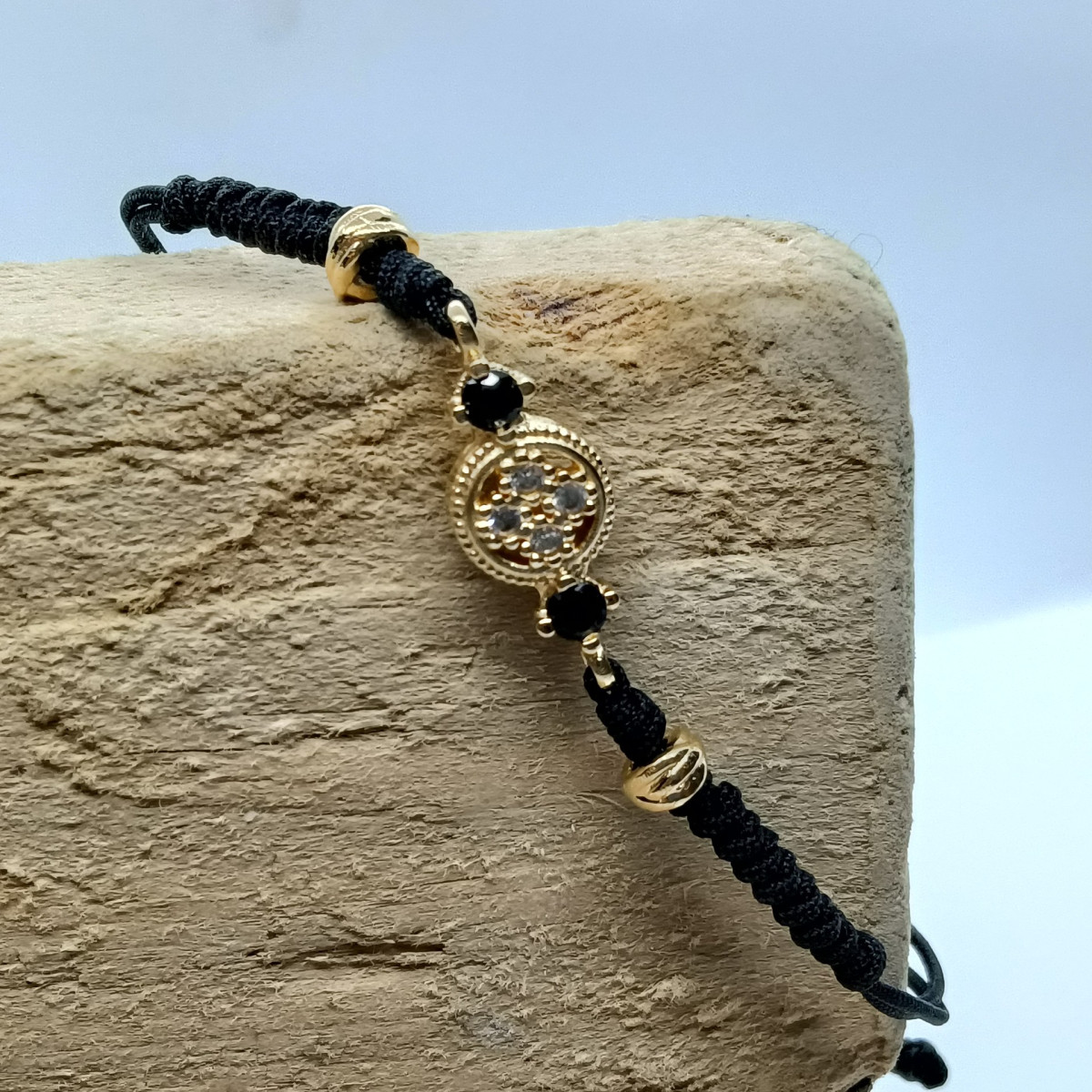 Pulsera de plata con macramé y circonita