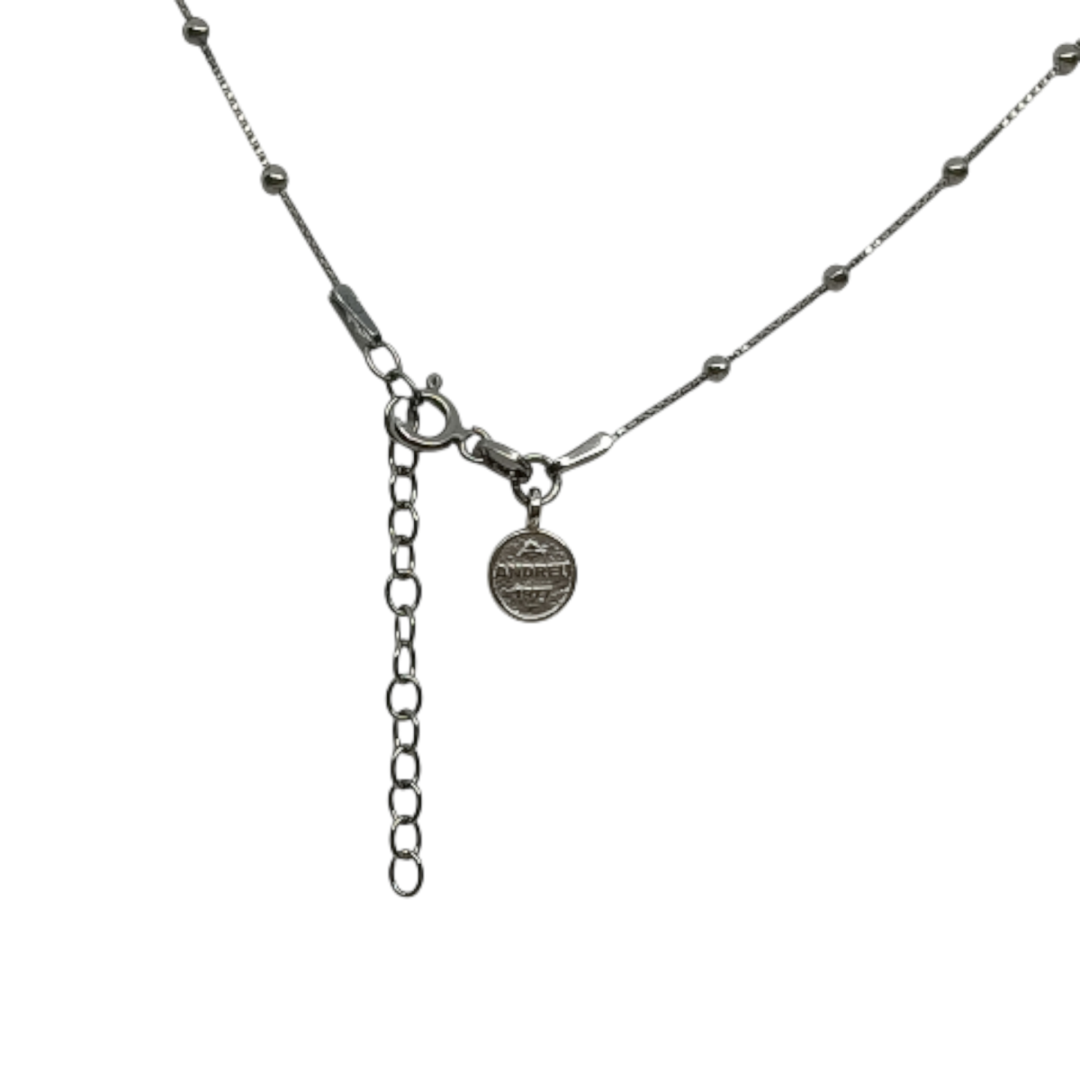 Collar de plata con forma de cruz y circonitas