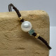Pulsera de plata con macramé, perla y circonitas