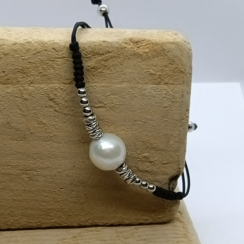 Pulsera de plata con macramé y perla