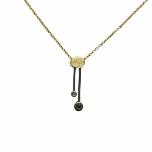 Colgante de plata y oro con diamante