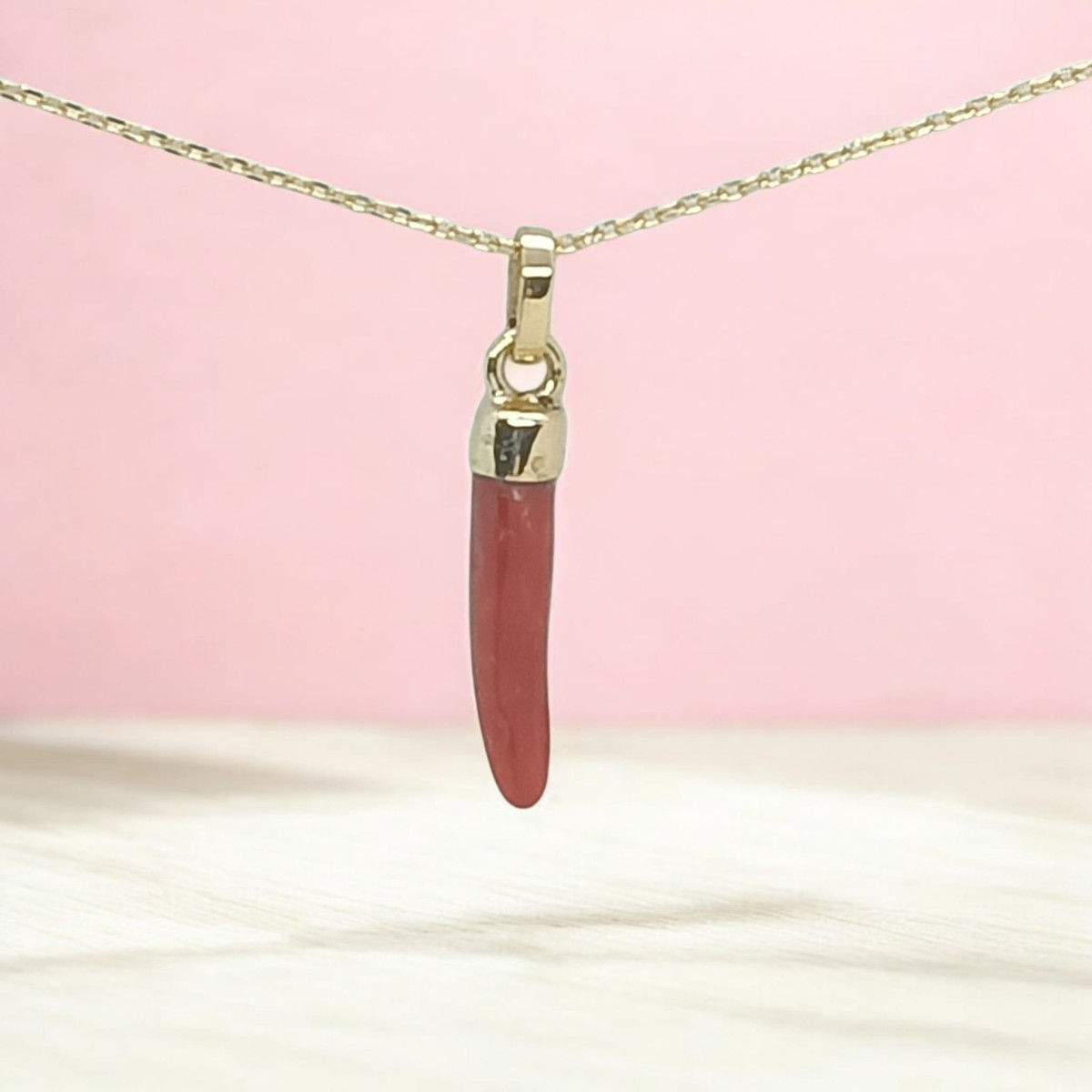 Colgante de oro y coral