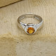 Anillo de oro blanco con citrino naranja