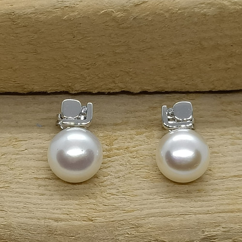 Pendientes tú y yo, oro blanco con diamantes y perlas