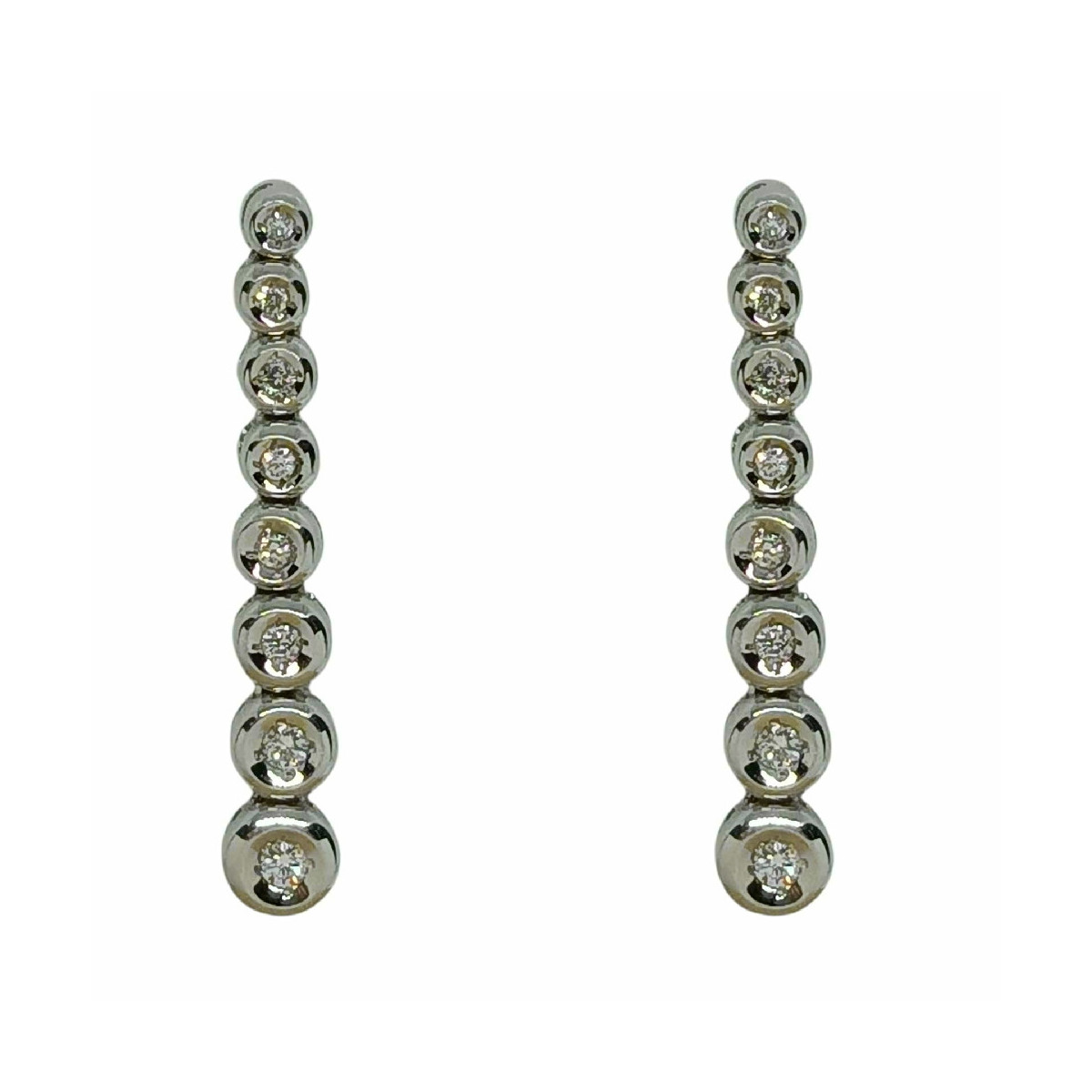 Pendientes largos de oro blanco y diamantes