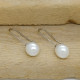 Pendientes largos de oro blanco con perlas