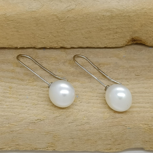 Pendientes largos de oro blanco con perlas