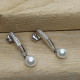 Pendientes largos de oro blanco con perla  y diamantes