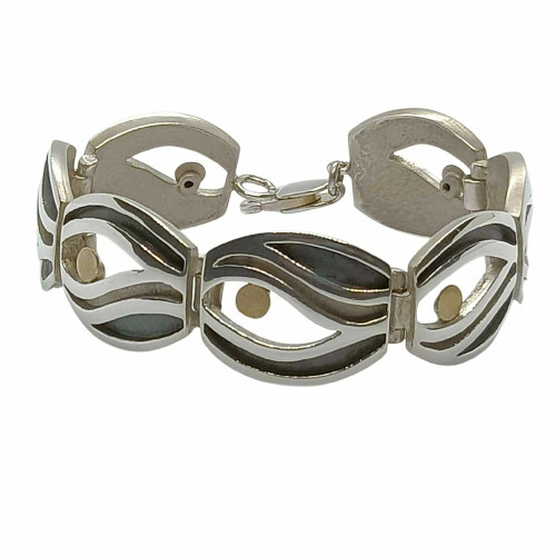 Brazalete articulado de plata y oro