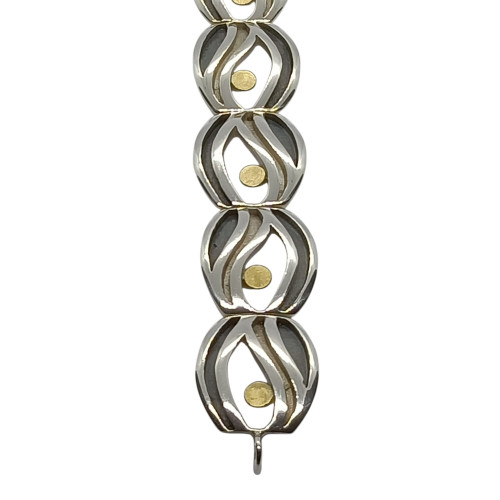 Brazalete articulado de plata y oro