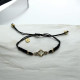 Pulsera de plata con macramé, circonita y nácar Pulsera de plata con macramé, circonita y nácar