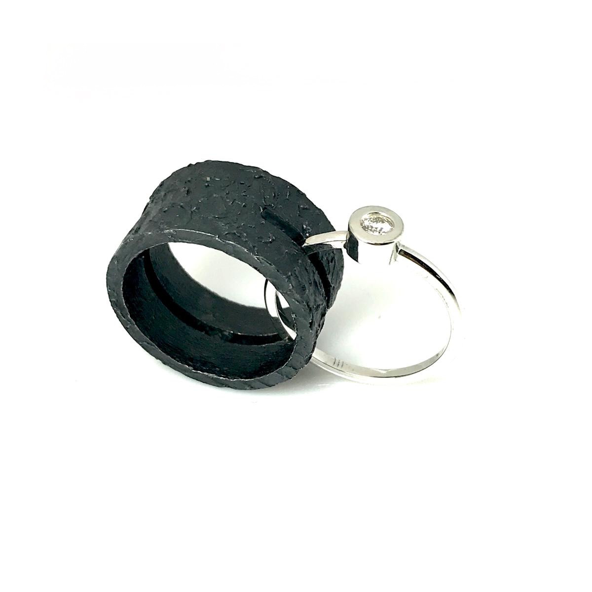 Anillo de plata y oro blanco con diamante