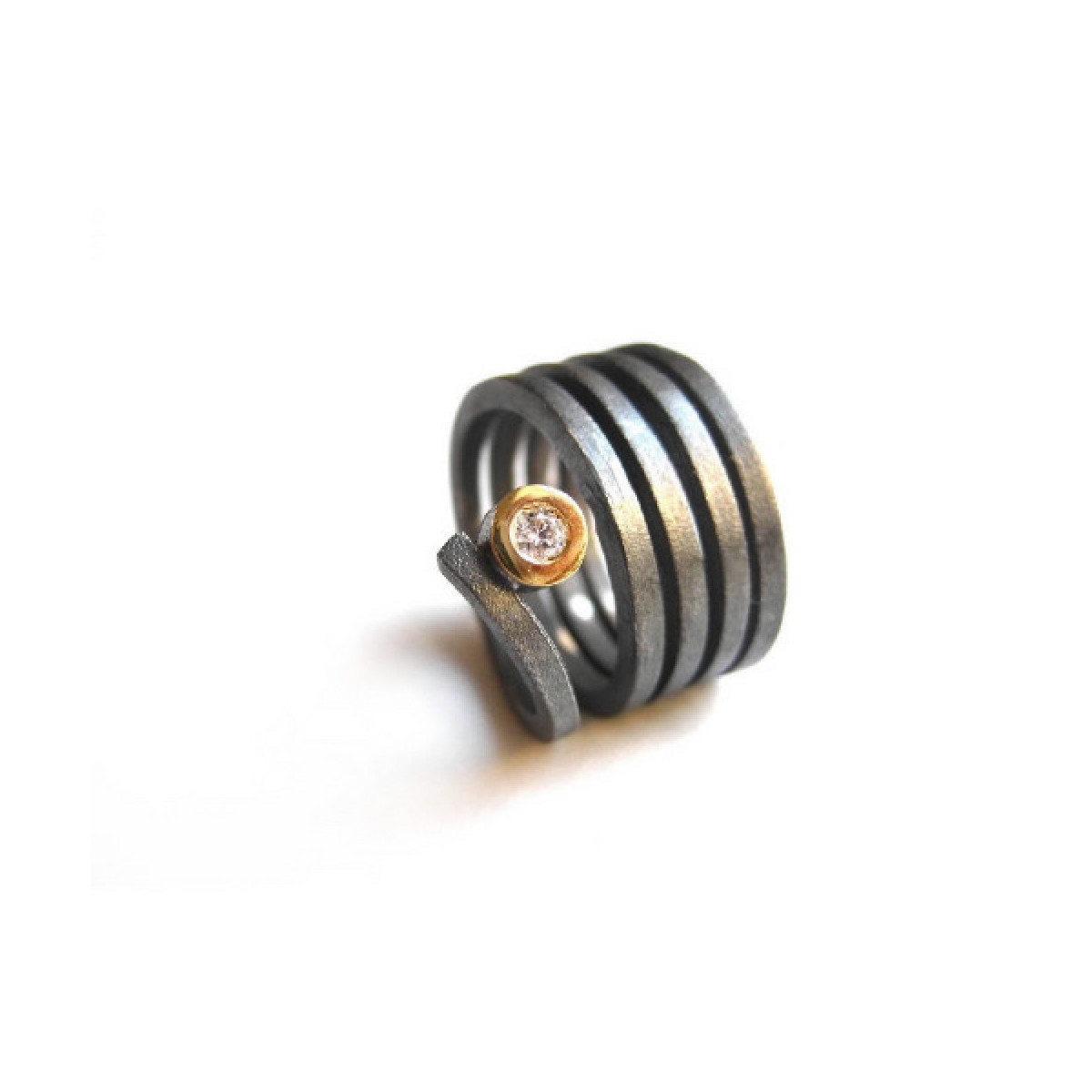 Anillo de plata y oro con diamante