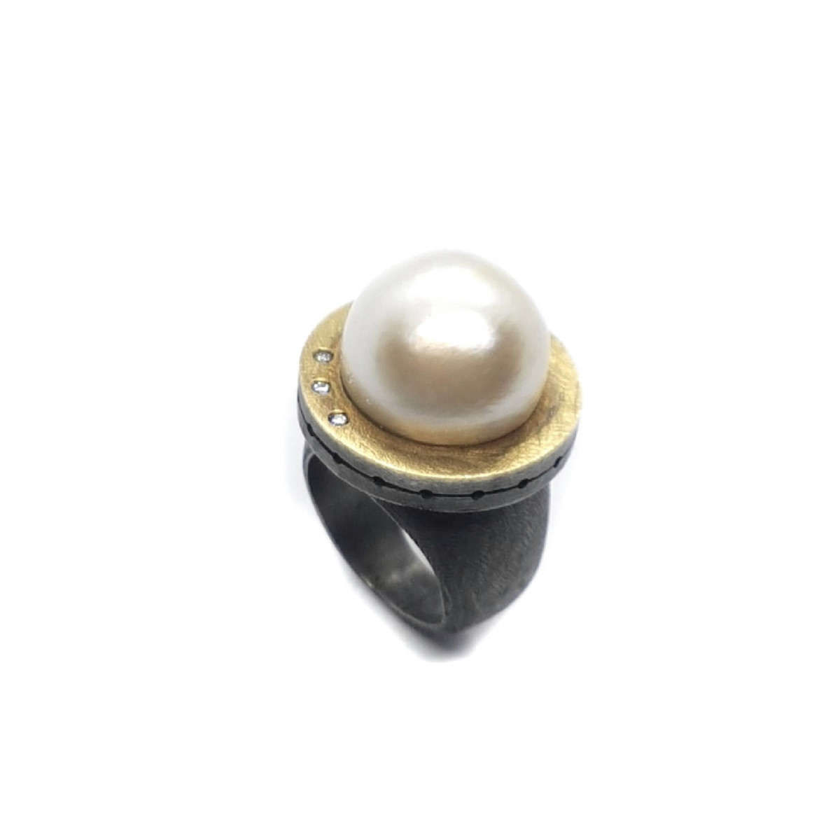 Anillo de plata y oro con perla natural cultivada Australiana y diamantes