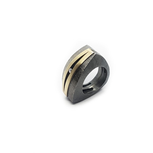 Anillo de plata y oro con diamante